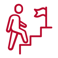 Person walking up steps toward flag icon